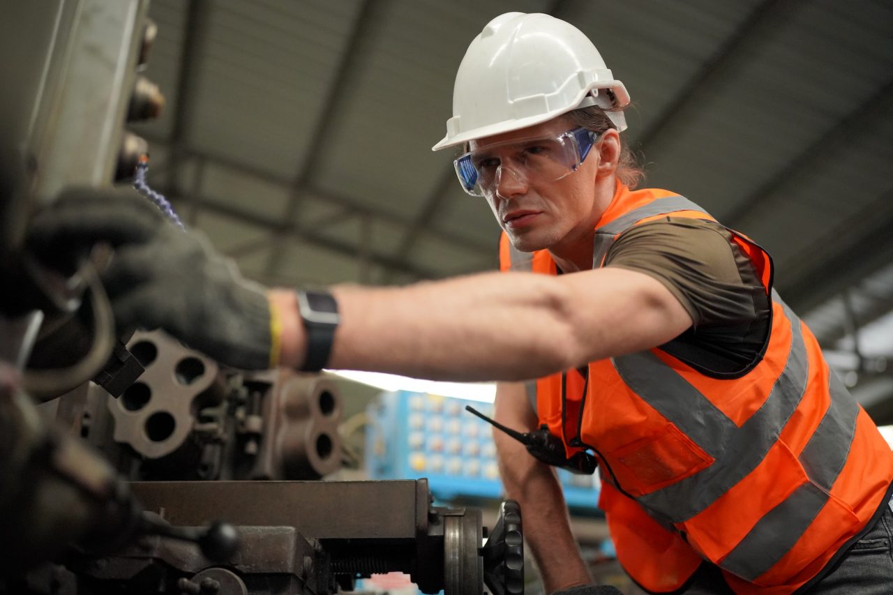 Delivery associate at work in an industrial facility